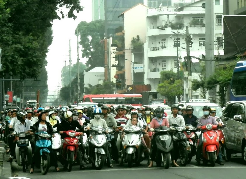 A photo of a street crowded with commuters in Vietnam's largest city, Ho Chi Minh City. 
