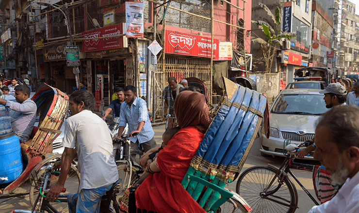 A photo of a crowded intersection in Dhaka, Bangladesh