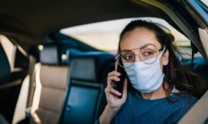 How to Uplift Immigrant and Refugee Communities in a Post-Pandemic World: Key Insights from a WES Social Media Forum Lead image: Young businesswoman wearing healthcare mask